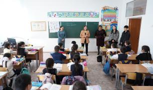 Teach For Qazaqstan staff visit a classroom