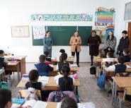 Teach For Qazaqstan staff visit a classroom