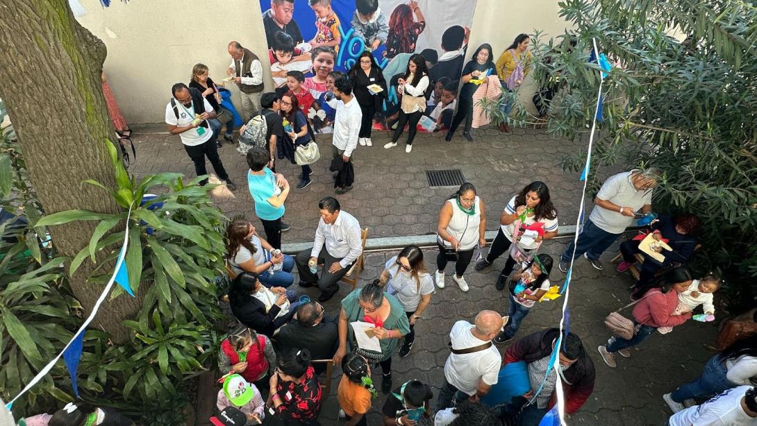 Overhead shot of an gathering taking place in an outdoor courtyard